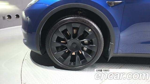 Tesla Model Y 2024 — photo 5