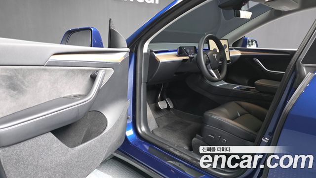 Tesla Model Y 2024 — photo 13