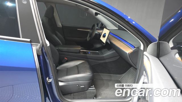 Tesla Model Y 2024 — photo 17