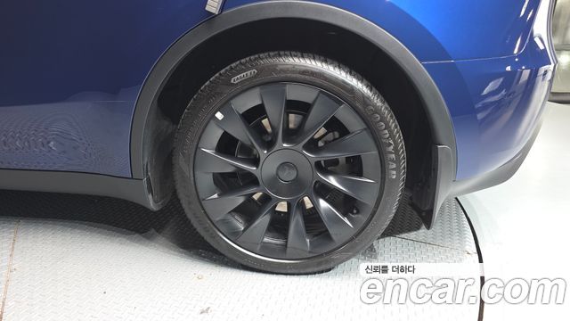 Tesla Model Y 2024 — photo 7