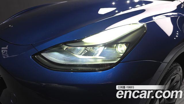 Tesla Model Y 2024 — photo 8