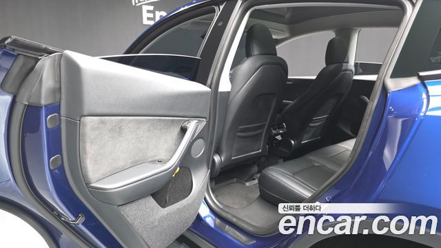 Tesla Model Y 2024 — photo 16