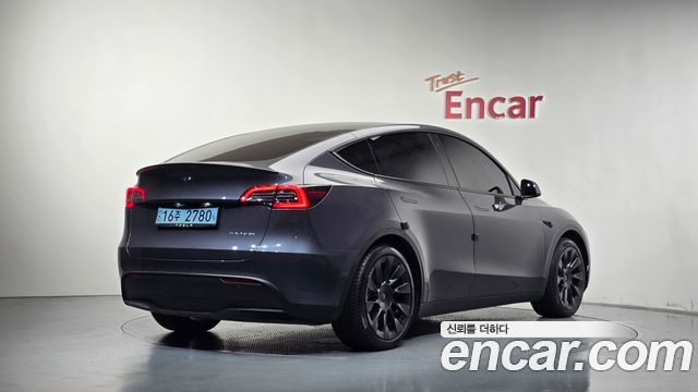 Tesla Model Y 2022 — photo 2