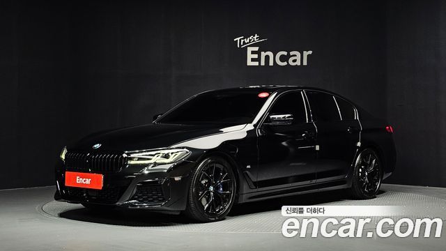 BMW 5-Series 2022 — photo 1