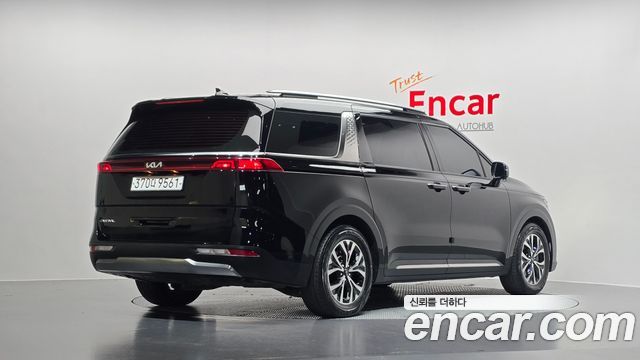 Kia Canival 2023 — photo 2