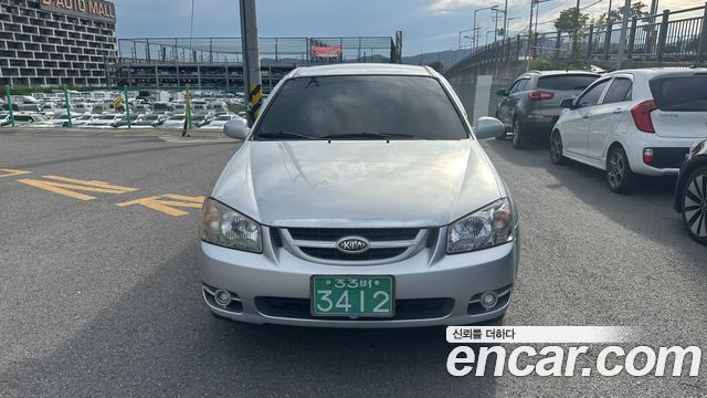 Kia Cerato 2006 — photo 1