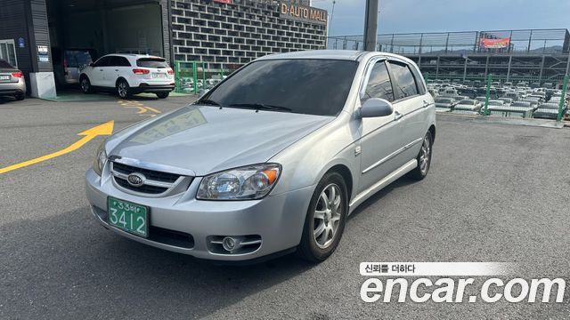 Kia Cerato 2006 — photo 2