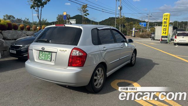 Kia Cerato 2006 — photo 4
