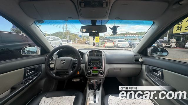 Kia Cerato 2006 — photo 7