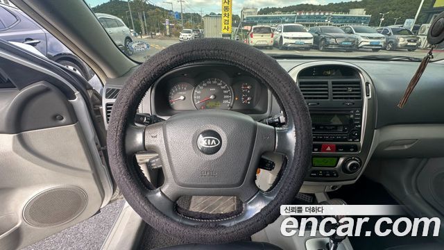 Kia Cerato 2006 — photo 10
