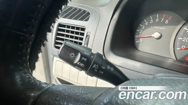 Kia Cerato 2006 — photo 11