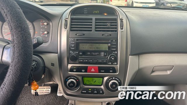 Kia Cerato 2006 — photo 14