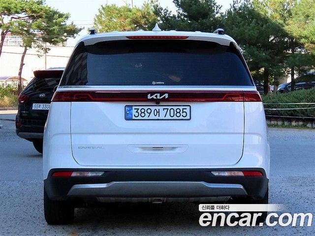 Kia Canival 2023 — photo 2