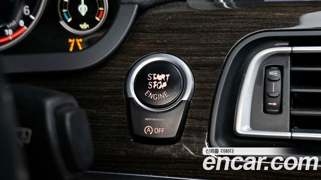 BMW 7-Series 2014 — photo 28