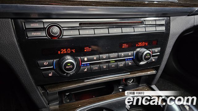 BMW 7-Series 2014 — photo 32