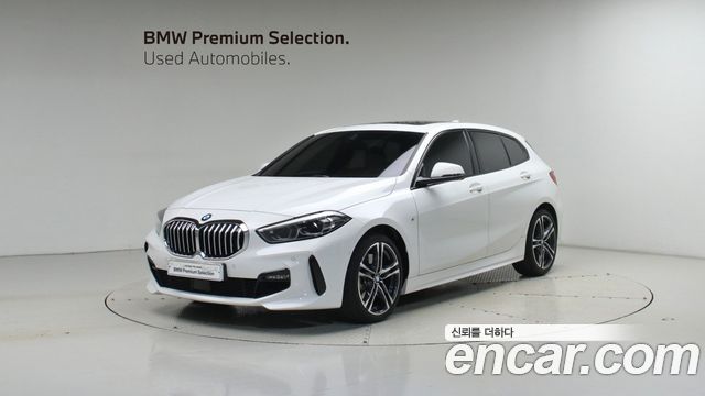 BMW 1-Series 2024 — photo 1