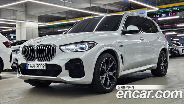 BMW X5 2022 — photo 1
