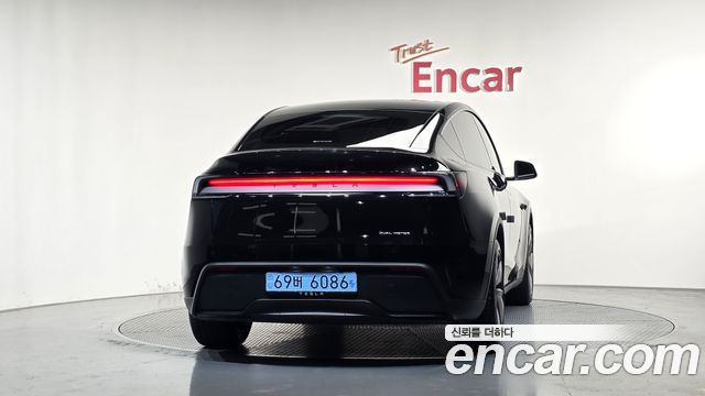 Tesla Model Y 2025 — photo 4