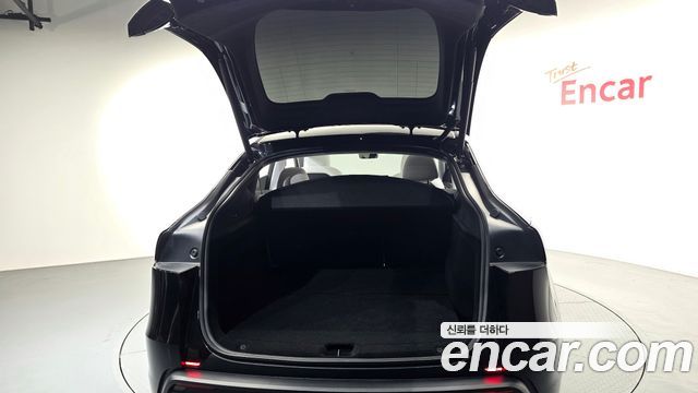 Tesla Model Y 2025 — photo 24