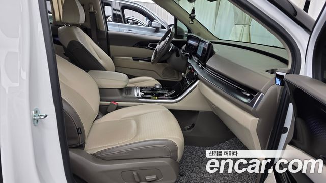 Kia Canival 2023 — photo 16