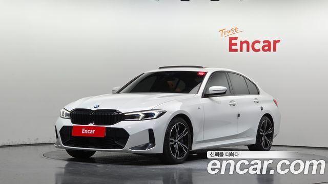 BMW 3-Series 2023 — photo 1