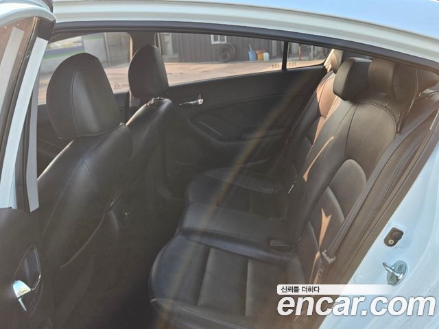Kia K3 2014 — photo 14
