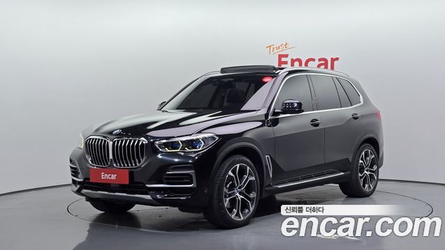 BMW X5 2022 — photo 1