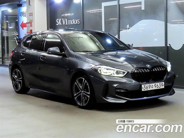 BMW 1-Series 2021 — photo 1