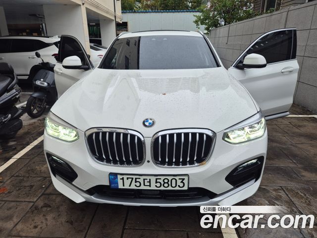 BMW X4 2021 — photo 1