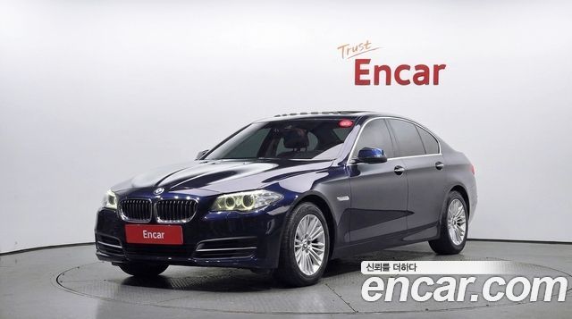 BMW 5-Series 2014 — photo 1