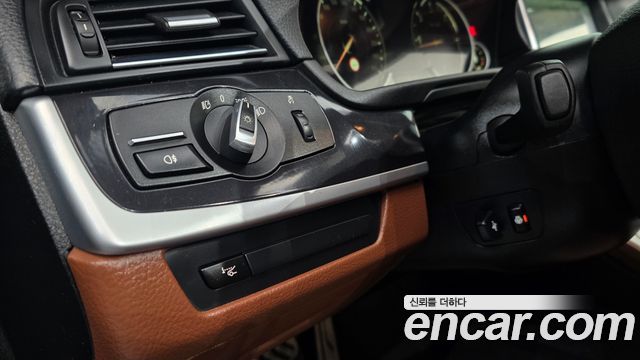 BMW 5-Series 2014 — photo 14
