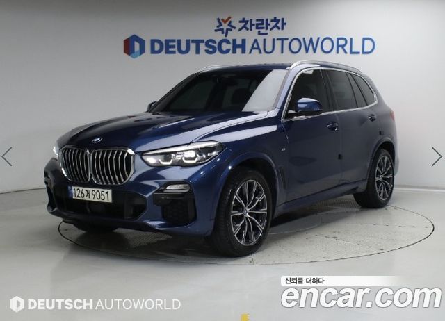 BMW X5 2021 — photo 1