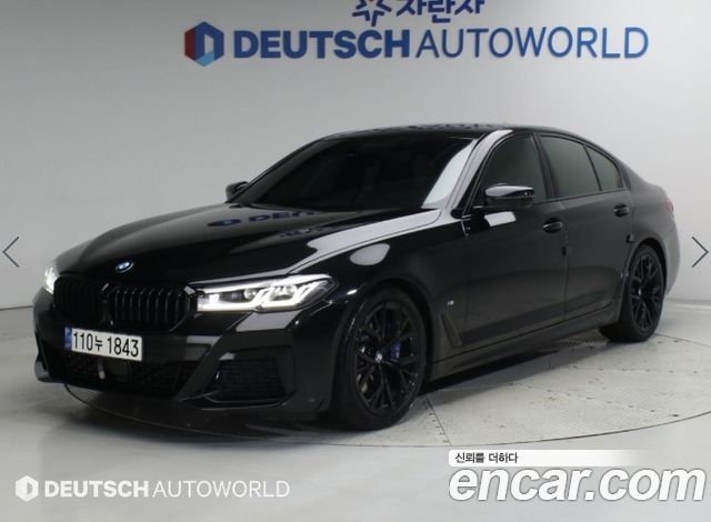 BMW 5-Series 2022 — photo 1