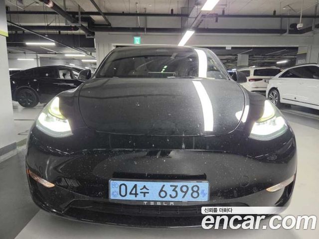 Tesla Model Y 2022 — photo 1