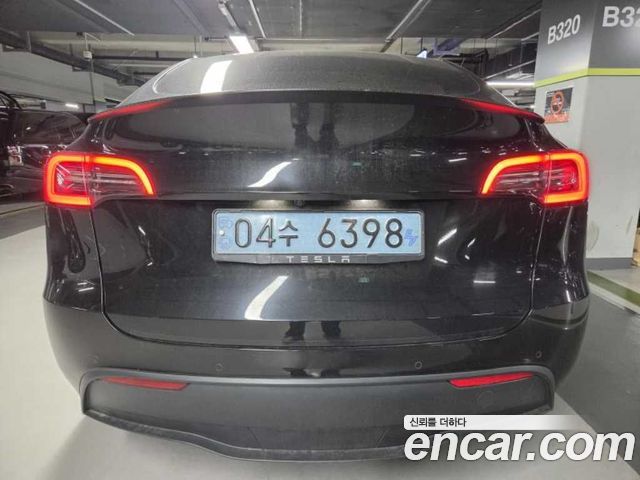 Tesla Model Y 2022 — photo 4