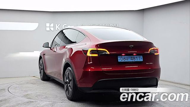 Tesla Model Y 2024 — photo 2