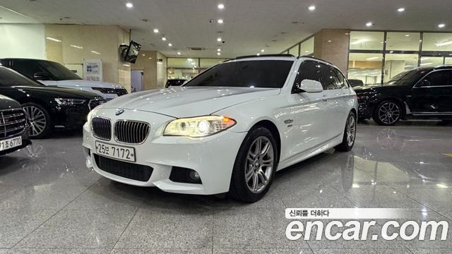 BMW 5-Series 2012 — photo 1