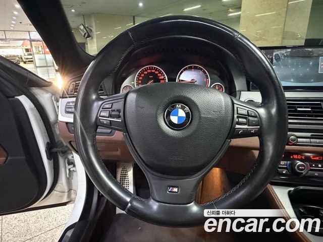 BMW 5-Series 2012 — photo 10