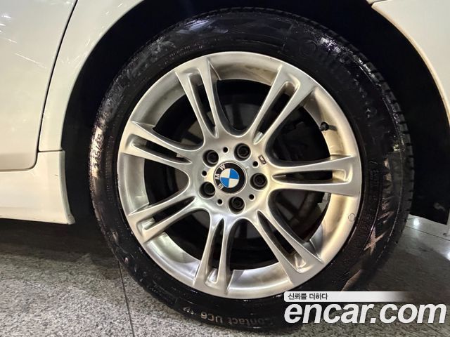 BMW 5-Series 2012 — photo 20
