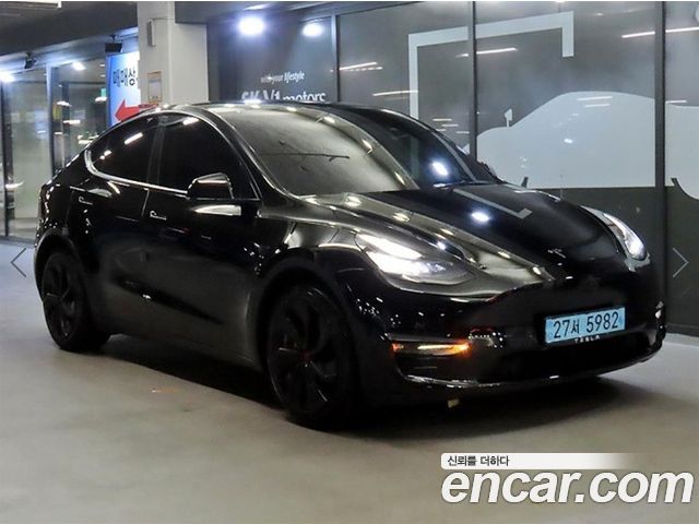 Tesla Model Y 2021 — photo 1