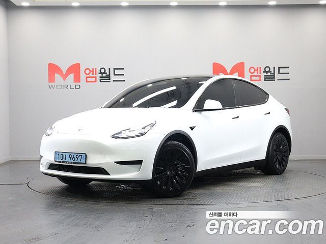 Tesla Model Y 2023 — photo 1