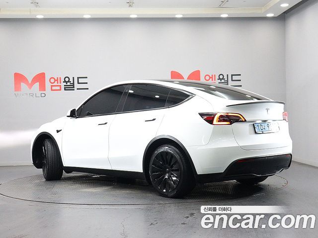Tesla Model Y 2023 — photo 4