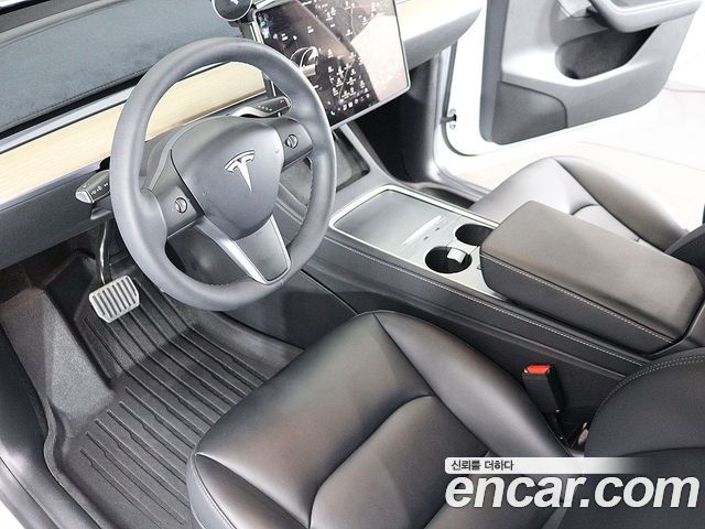 Tesla Model Y 2023 — photo 18