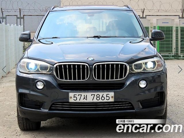 BMW X5 2014 — photo 1
