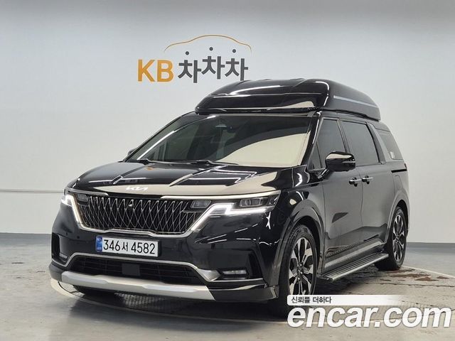 Kia Canival 2023 — photo 1