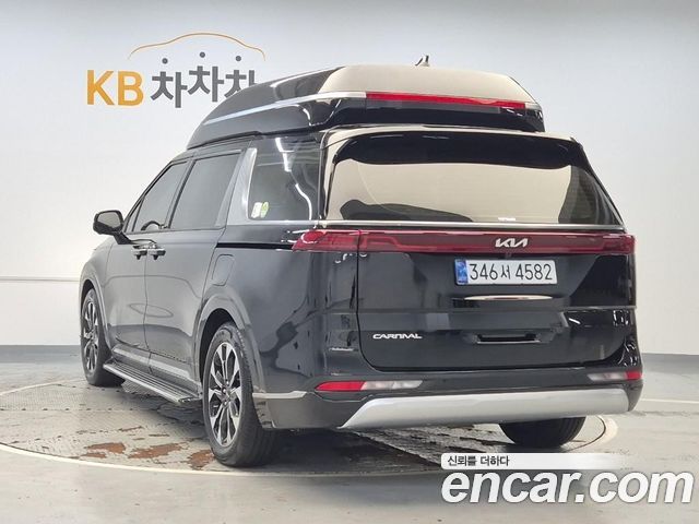 Kia Canival 2023 — photo 2