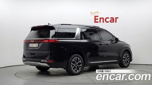 Kia Canival 2023 — photo 2