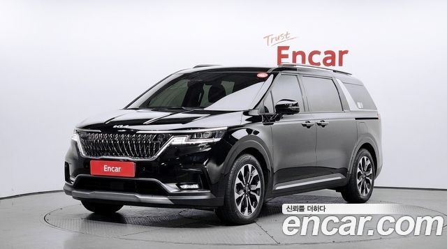 Kia Canival 2023 — photo 1