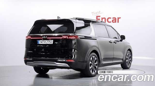 Kia Canival 2023 — photo 2