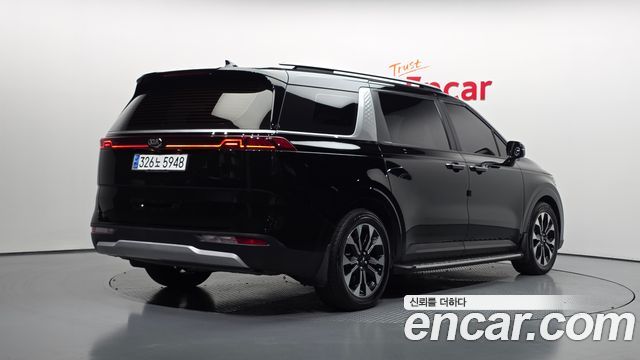 Kia Canival 2021 — photo 2